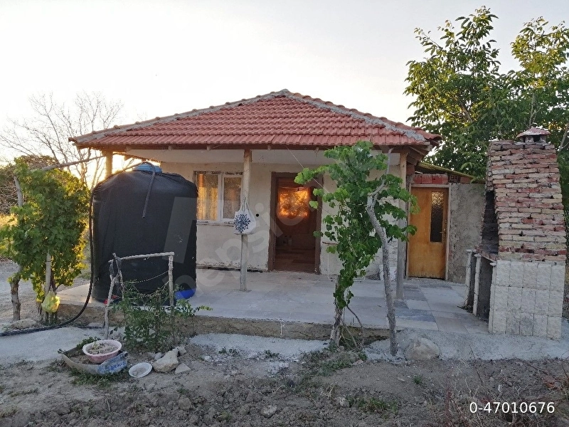 EVİ OLAN BAHÇE