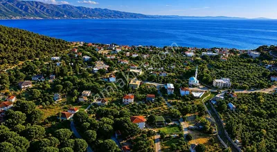 Armutlu Fıstıklı'da 463 M² Arsa İçerisinde 2 Yapı – Yola Cepheli