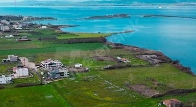 
          denize sıfır kat karşılığı Turizm + konut imarlı arsa 5100 m2
        