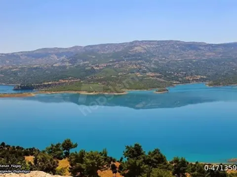 ALANYA & ANAMUR ARASI ERMENEK BARAJ MANZARALI EV YAPIMINA UYGUN 5.500m2 YOL+SU+ELEKTRİK İMKANI VARDR